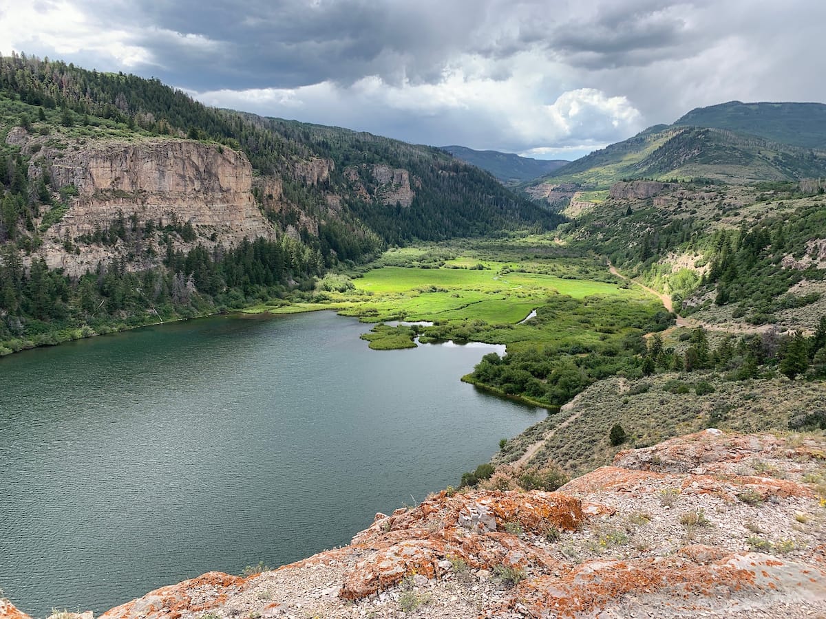 a beautiful mountain landscape with pond